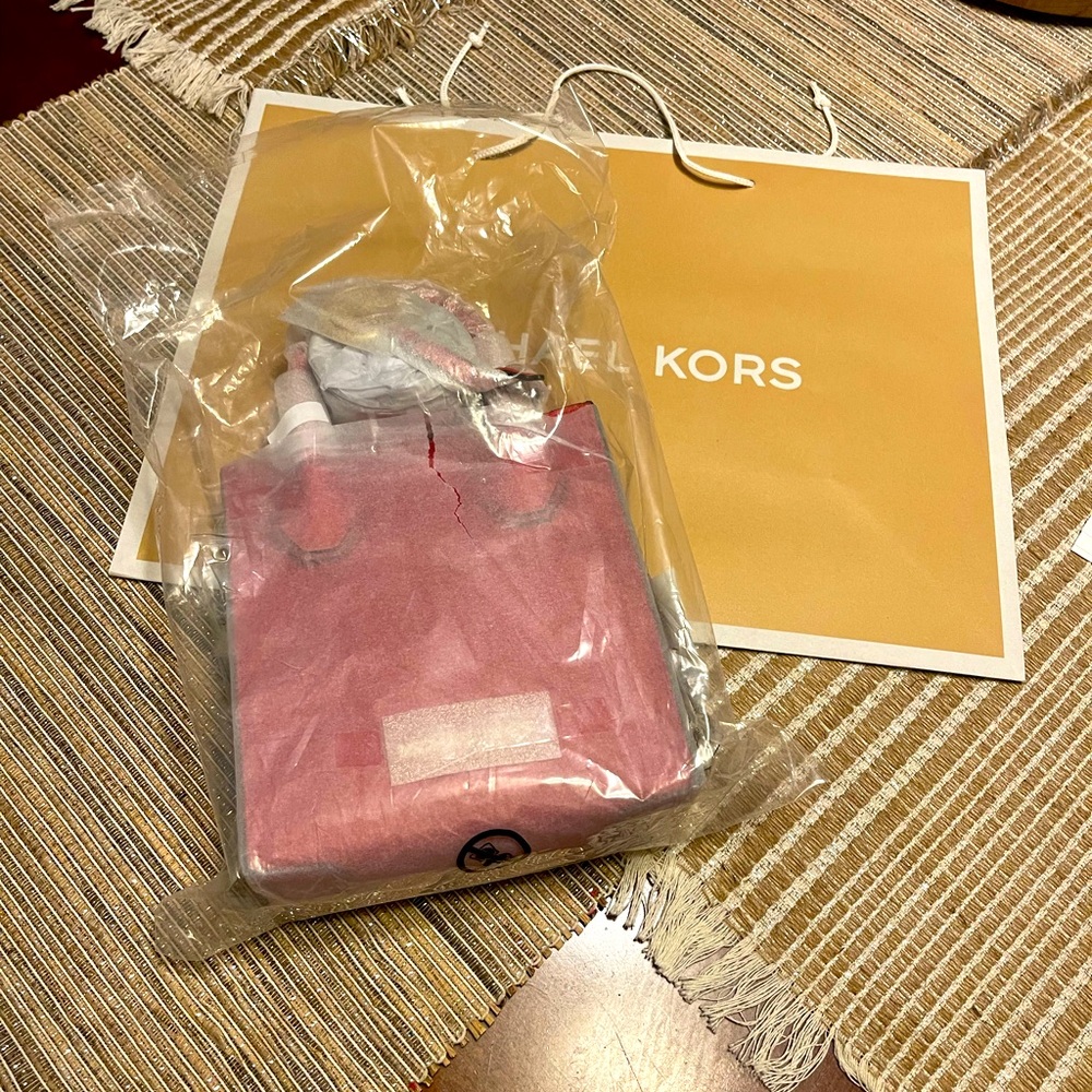Merrier extra small pebble leather crossbody bag Michael Kors